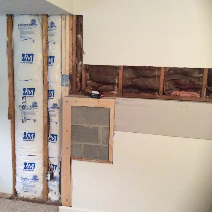 Wall insulation replacement during Basement Flood Cleanup in Manor